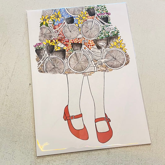 Illustration of a person with bicycles and flowers on a textured surface