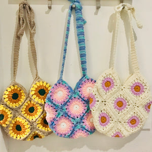 handmade crochet granny square shoulder bags with adjustable straps in different coloured wools