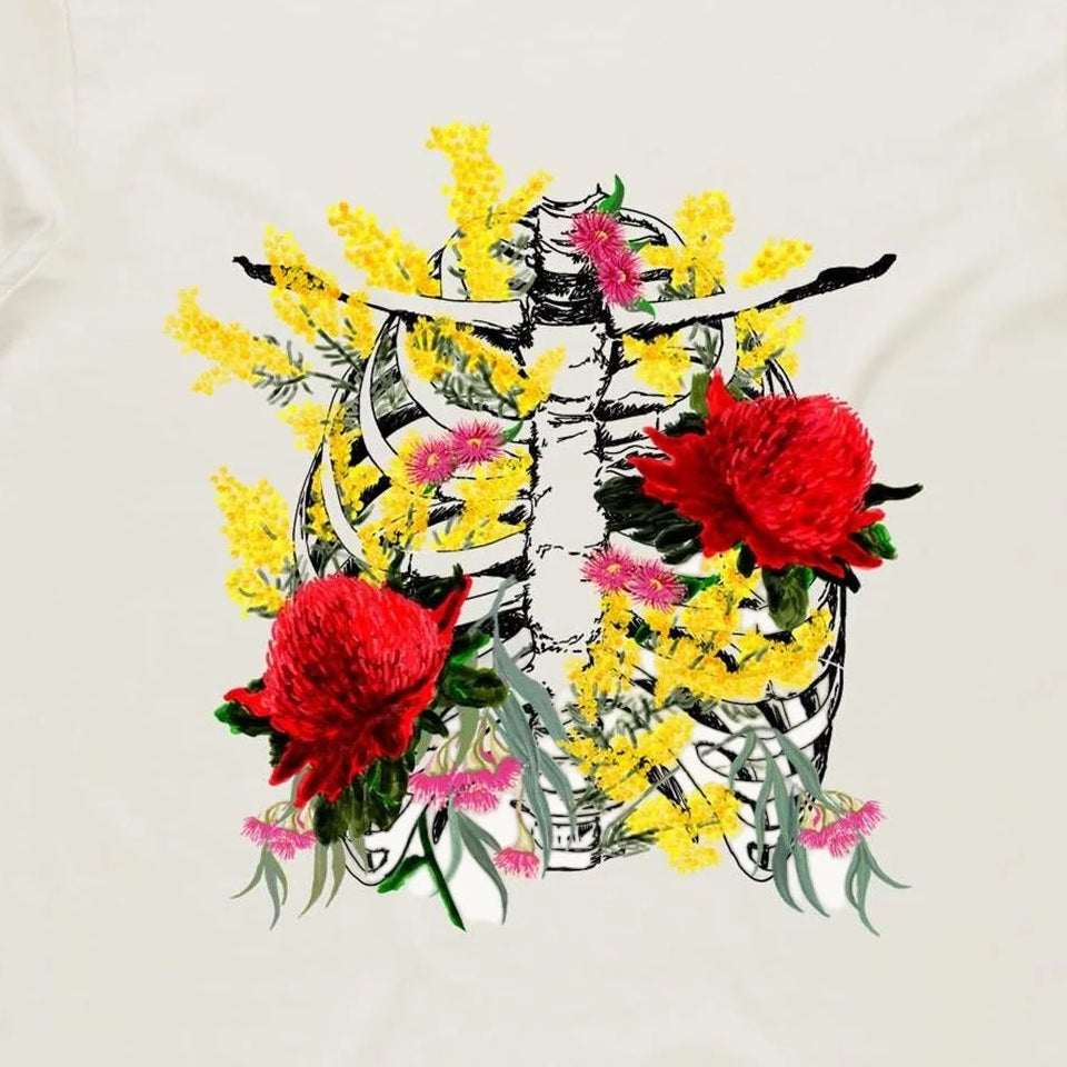 White t-shirt with floral design on a white background