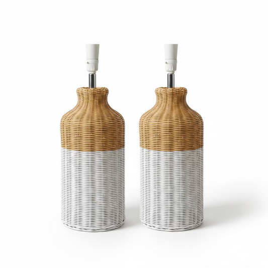 Two tall decorative lamp bases with a woven wicker-style finish, featuring a natural tan upper section and a white lower section, placed on a white background