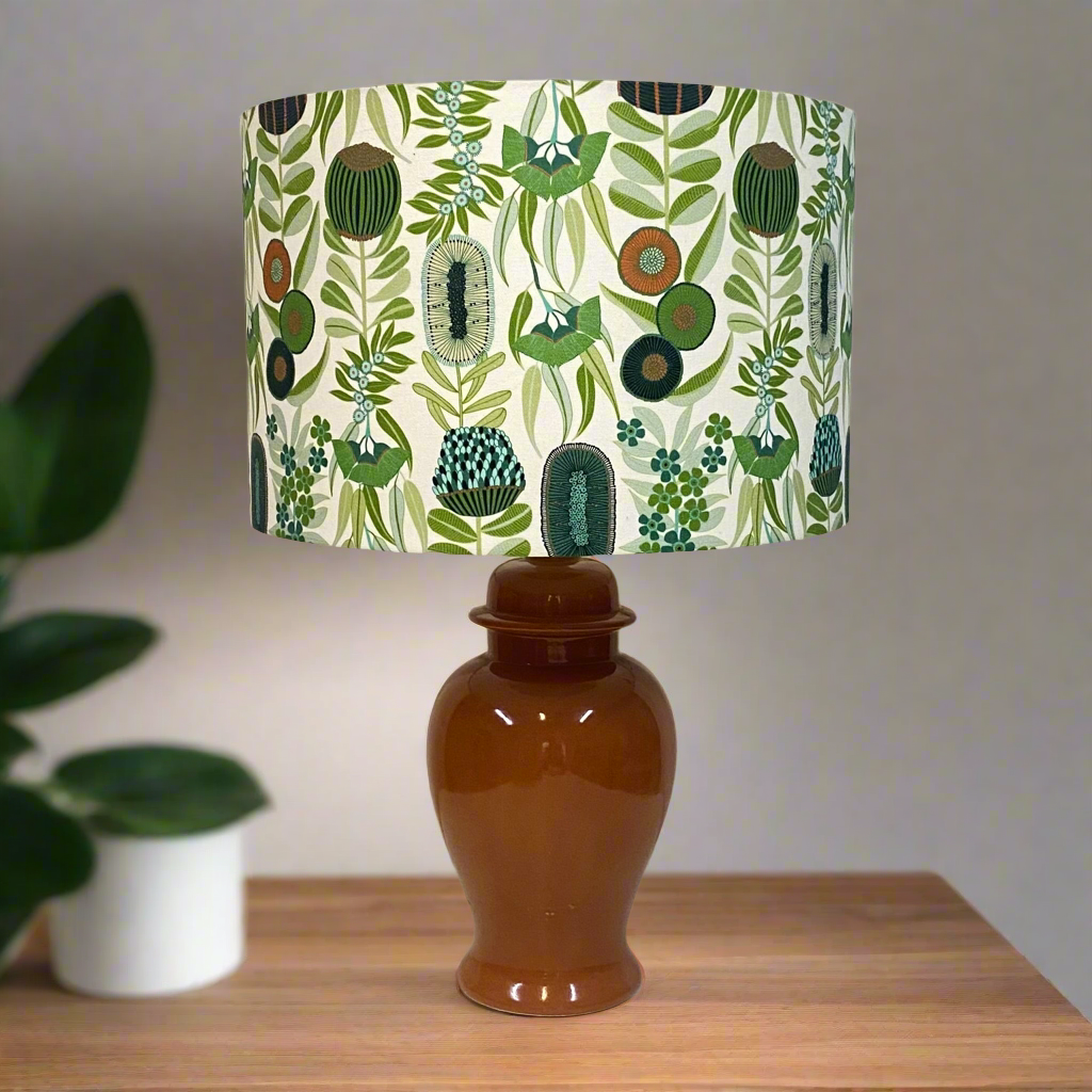 Mocha coloured Mid Century ceramic table lamp with a 40cm green native floral shade