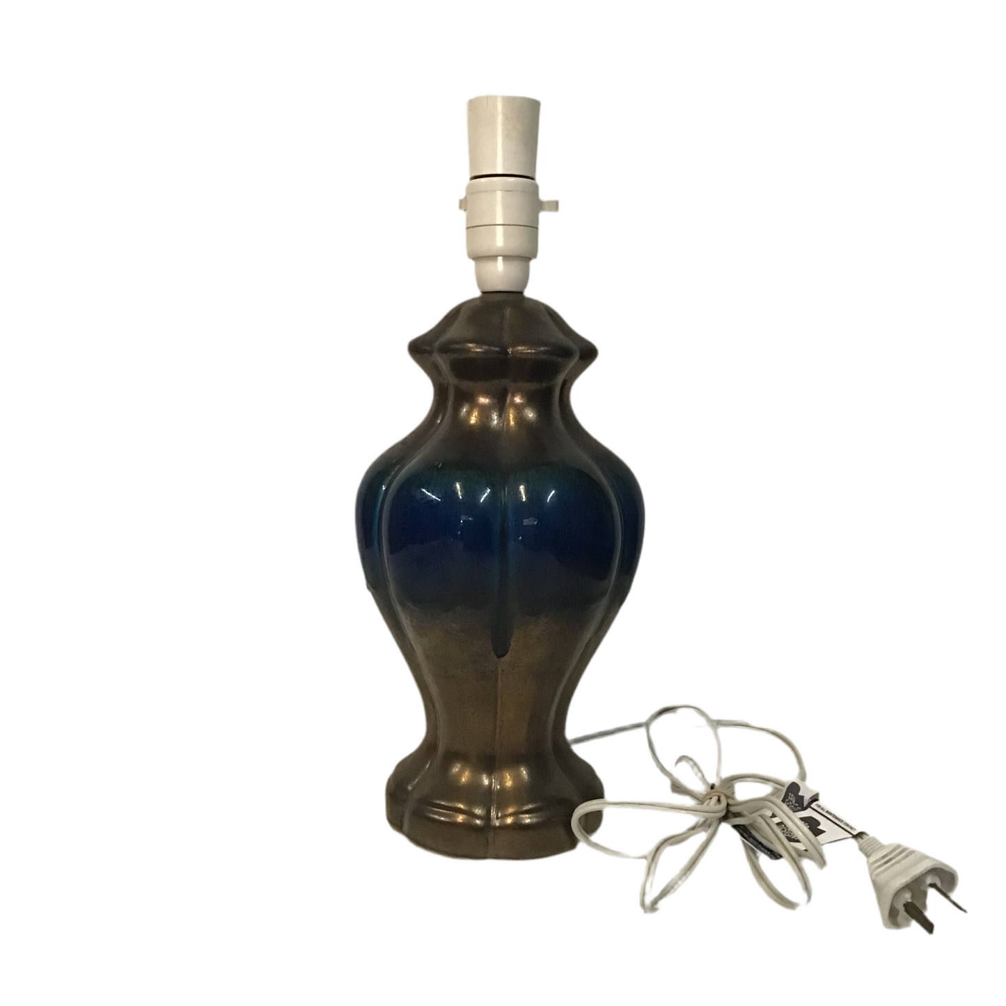 Decorative table lamp with a blue and bronze base on a white background
