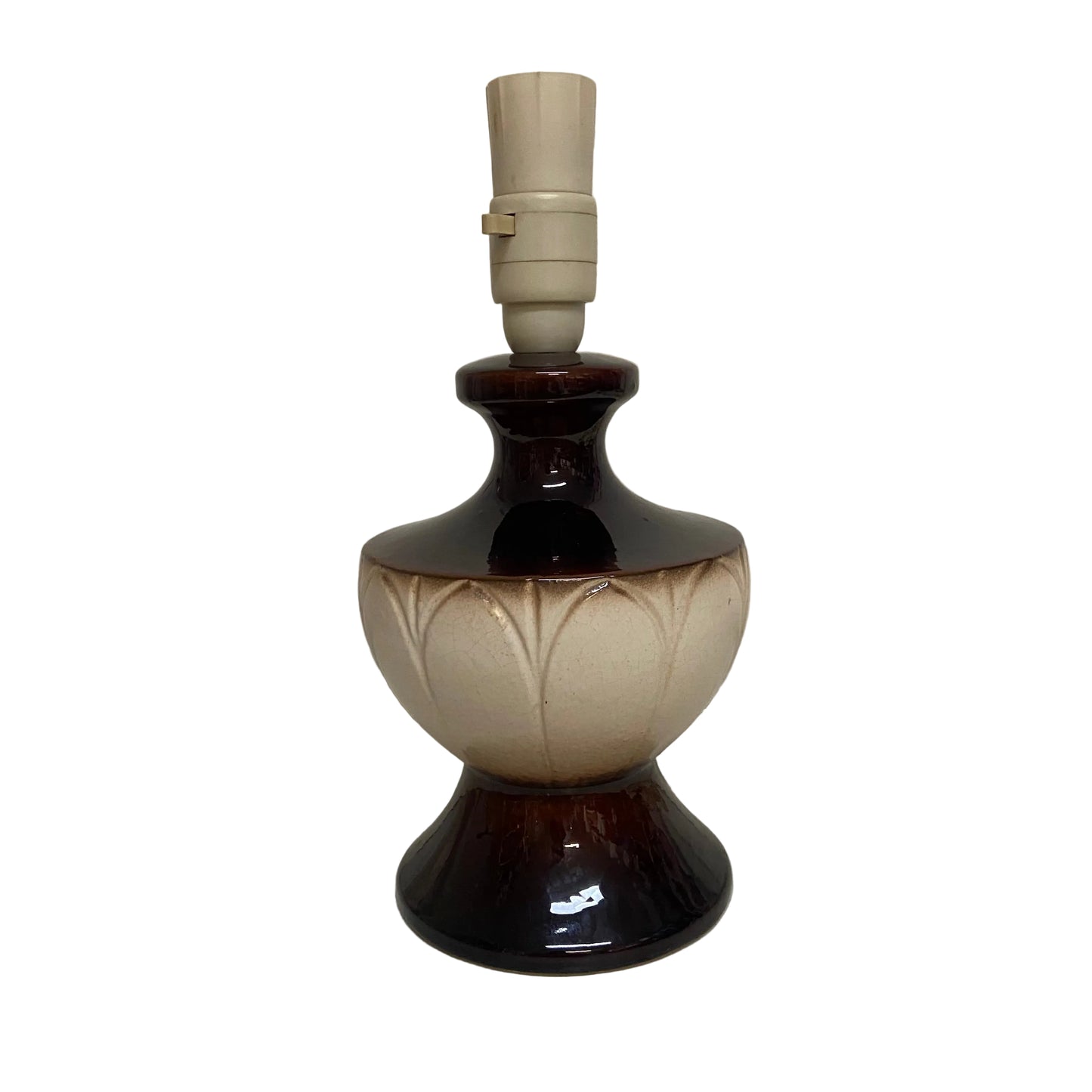 Decorative lamp with a brown and beige base on a white surface.