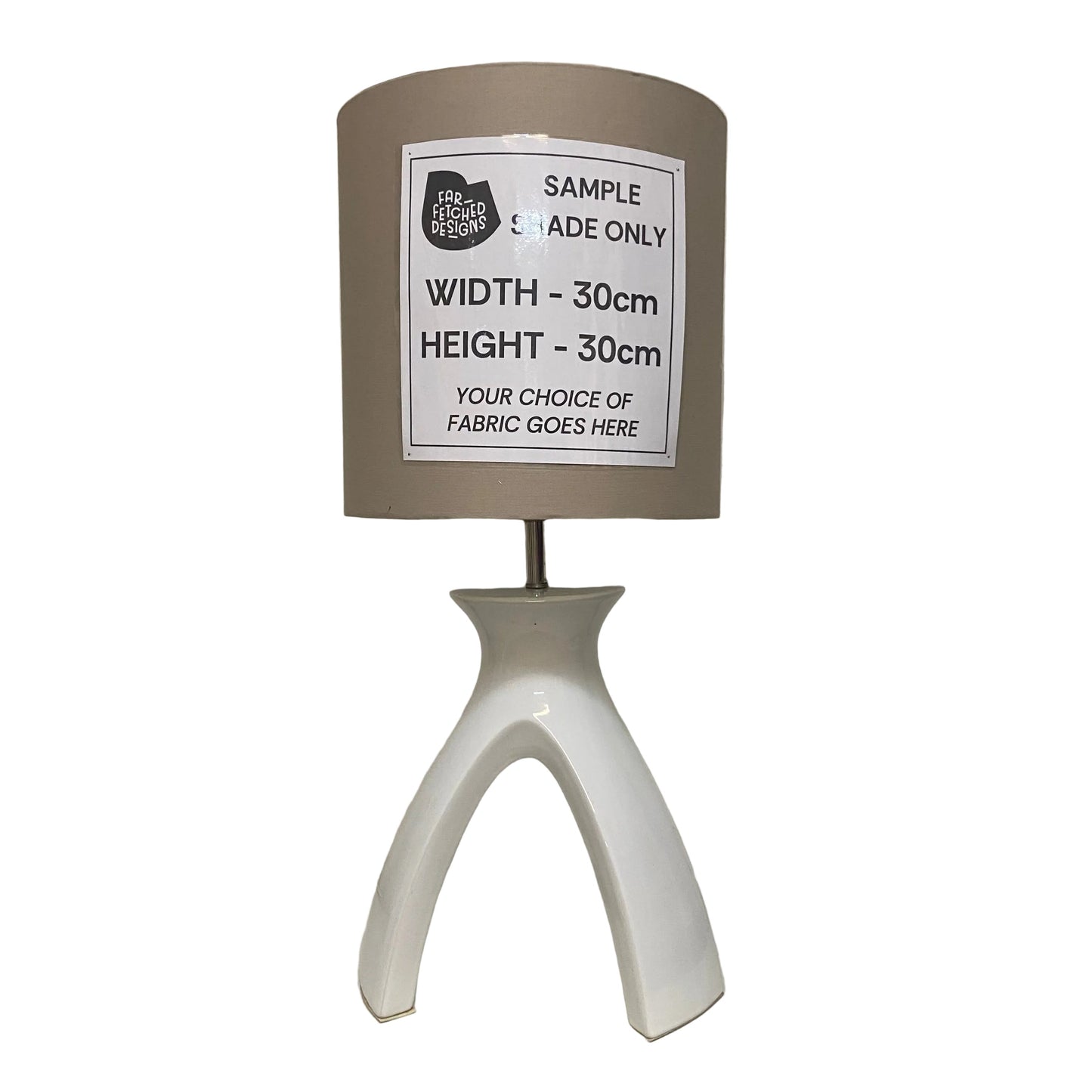 Lamp with a sample label on a white surface