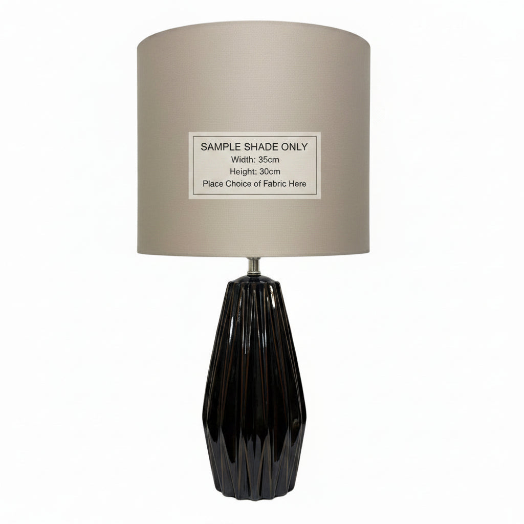 Lamp with a sample shade label on a neutral background