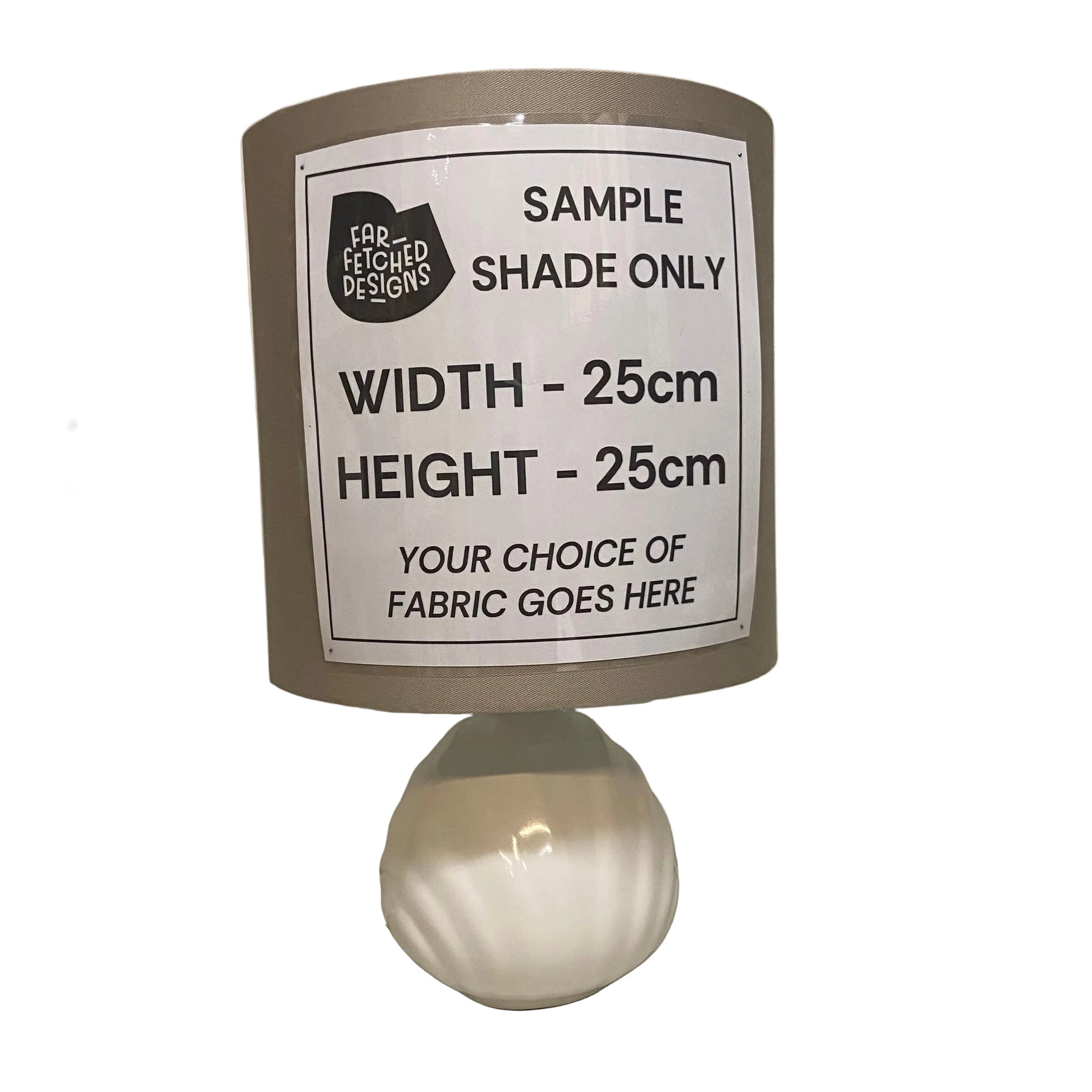 Sample lampshade with dimensions and fabric choice information on a plain background