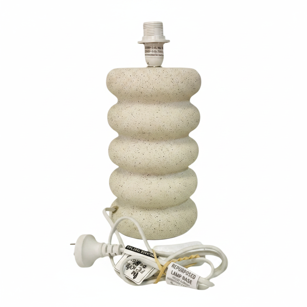  concrete table lamp base with stacked boulders design, beige in color, accompanied by power cords but without shades.