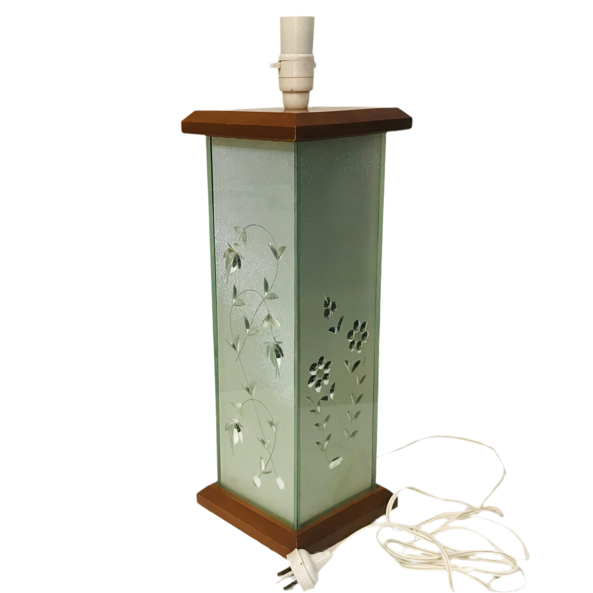 A lamp base with a square etched glass design and wooden detailing at the top and bottom.