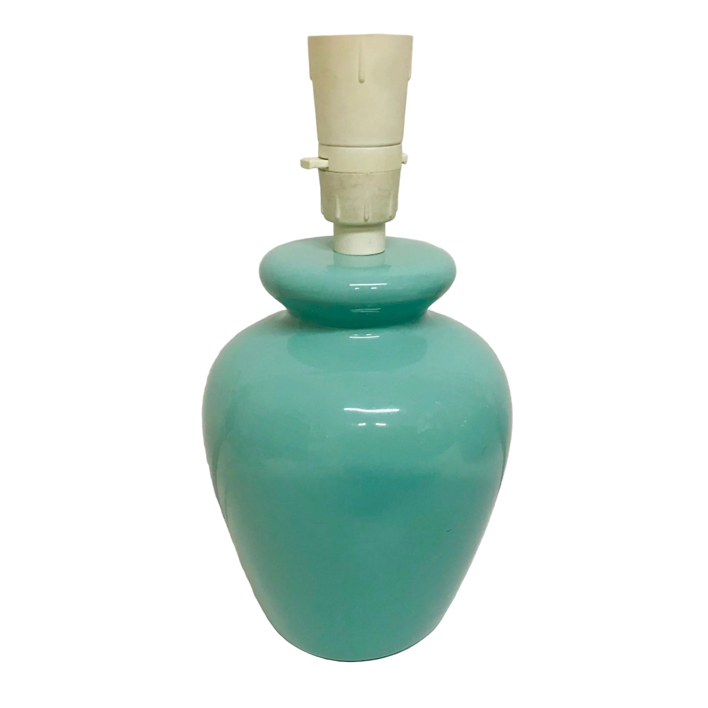 Turquoise ceramic lamp with beige lampshade on a white background