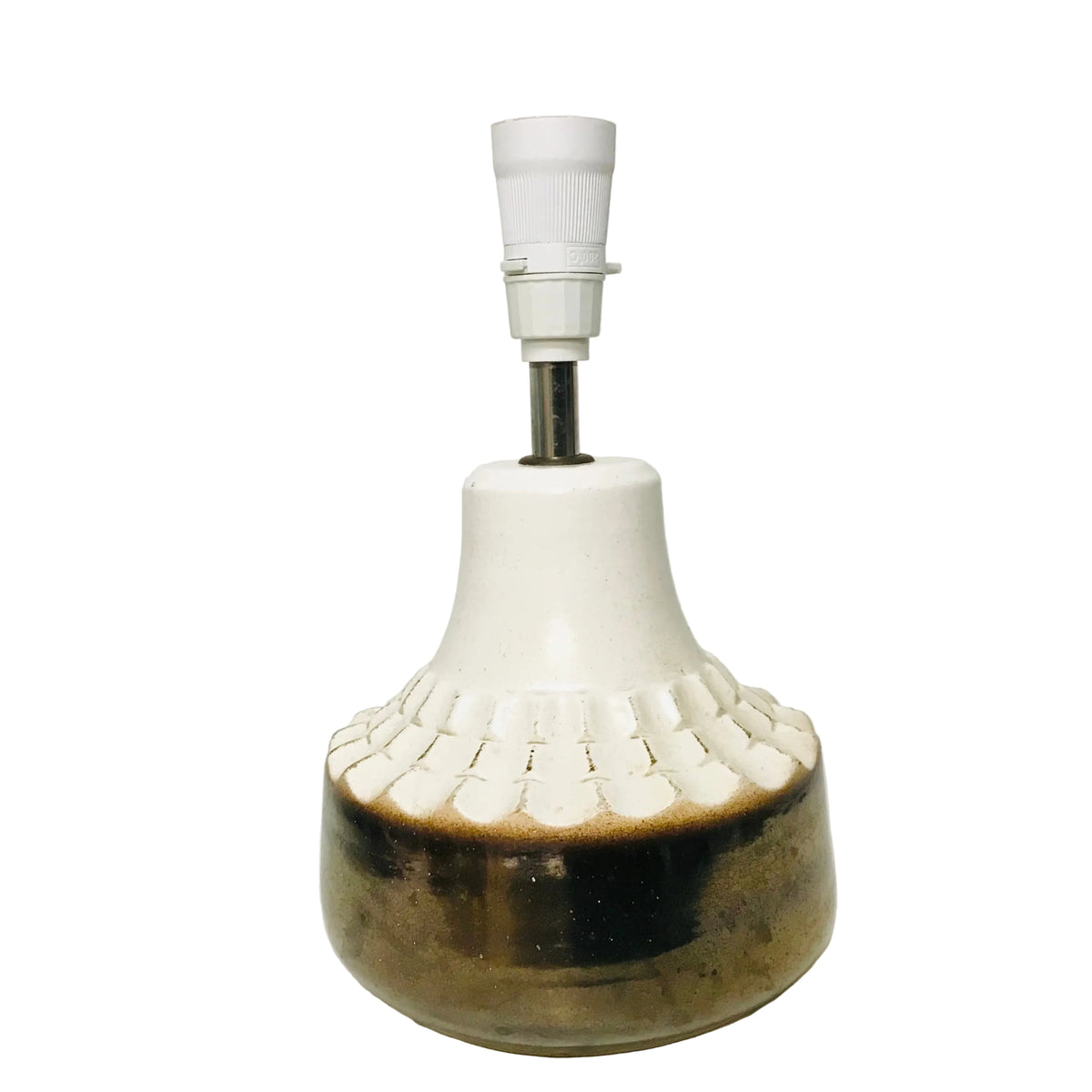 A vintage ceramic table lamp with a glossy white upper body, a textured cream-colored scalloped band, and a dark brown glazed base, featuring a white screw-in socket on top.