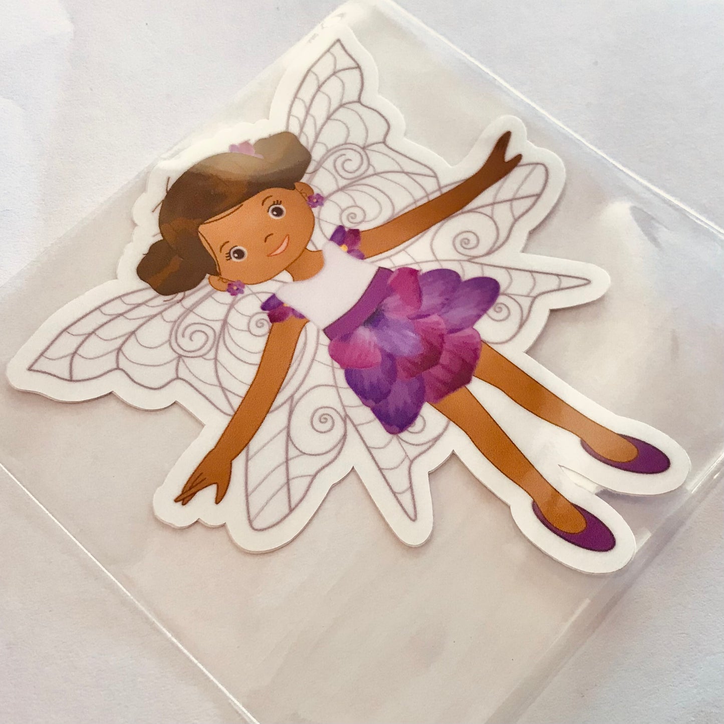 Fairy sticker with purple dress on a clear background