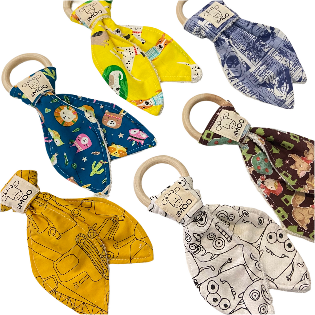 a collection of colourful organic bamboo teethers