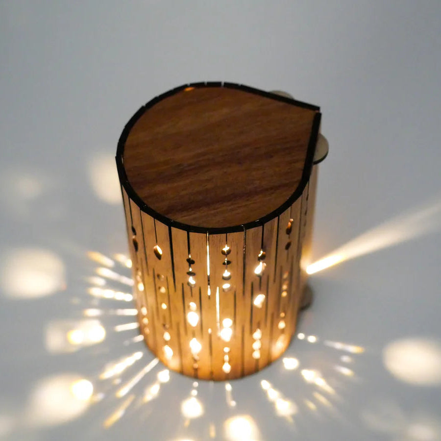 Wooden lamp with a textured surface on a white background