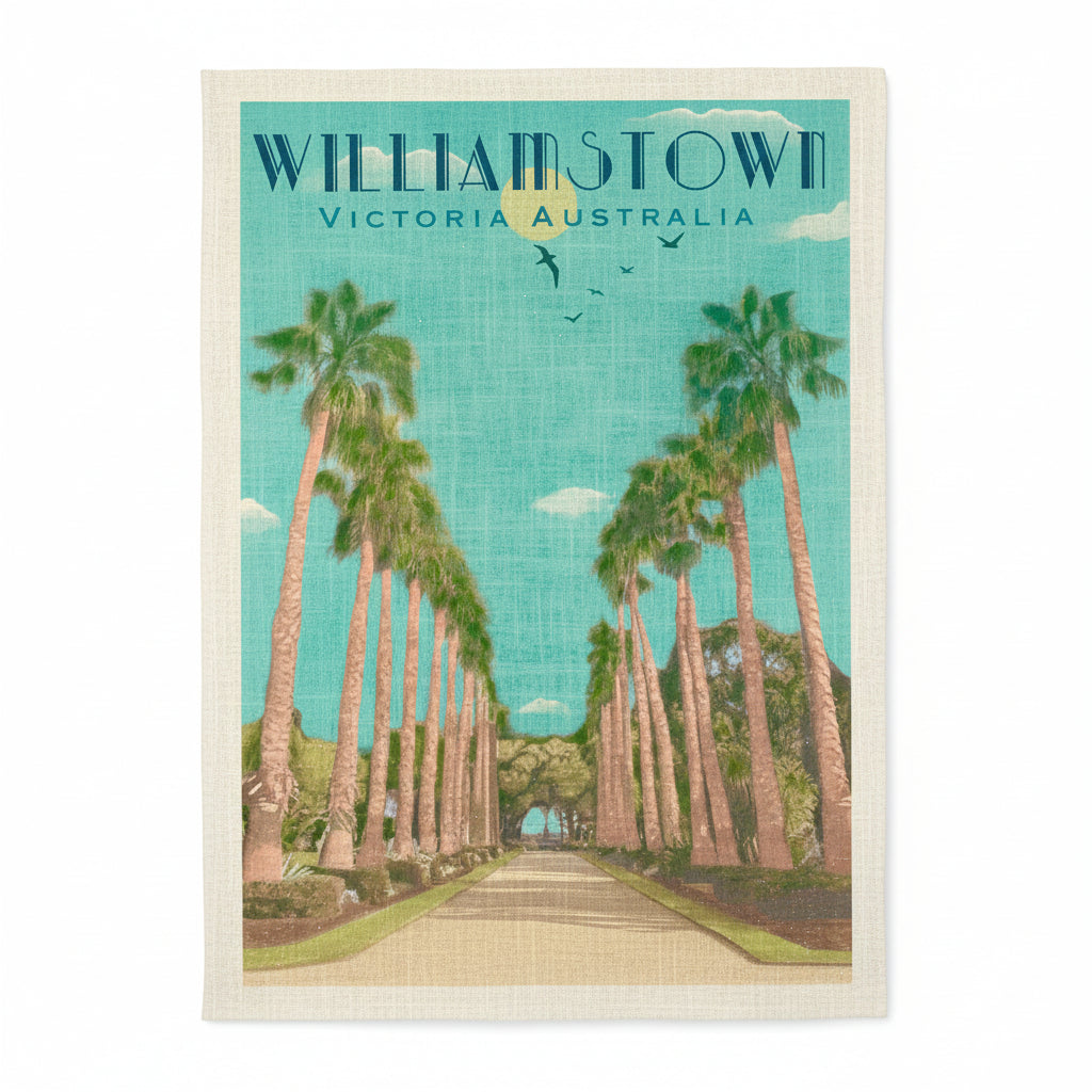 Person holding a tea towel with 'Williamstown, Victoria, Australia' design featuring palm trees.