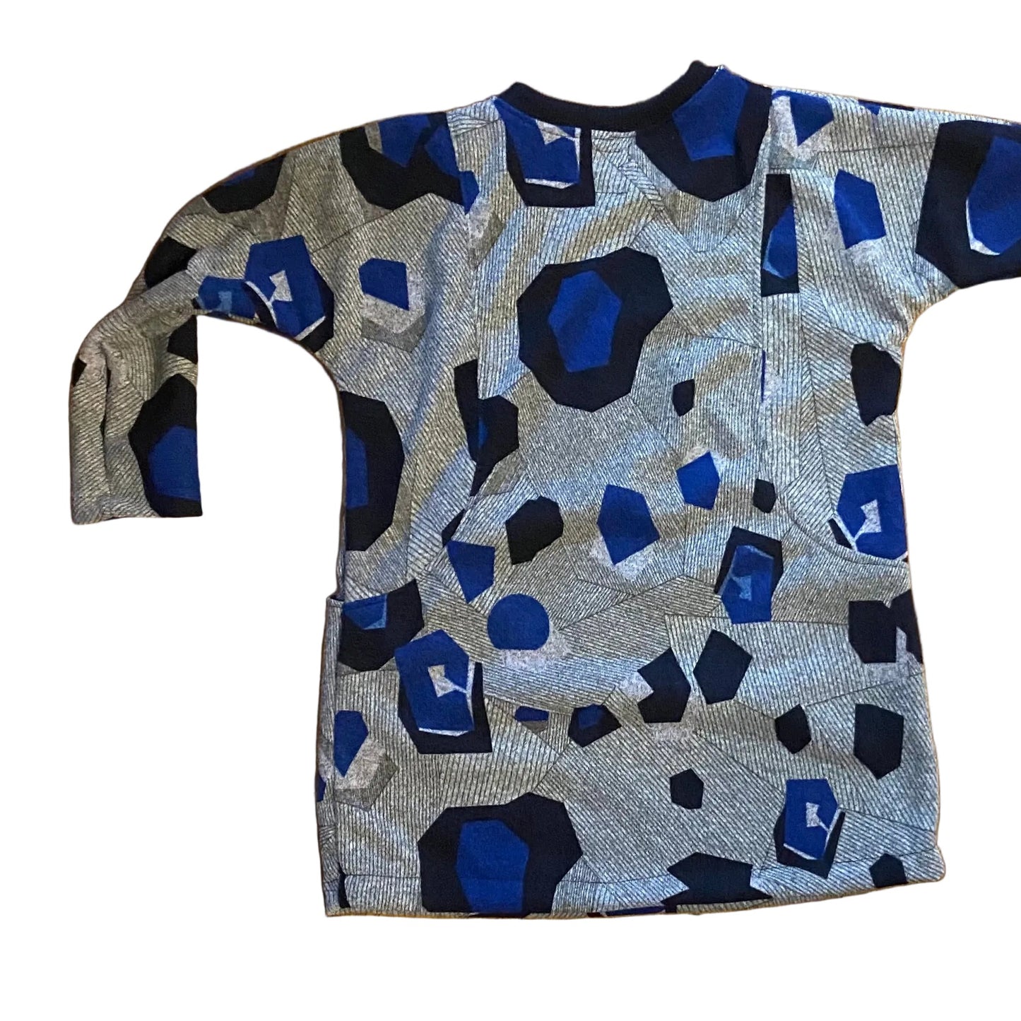 Long-sleeve shirt with geometric pattern on a white background