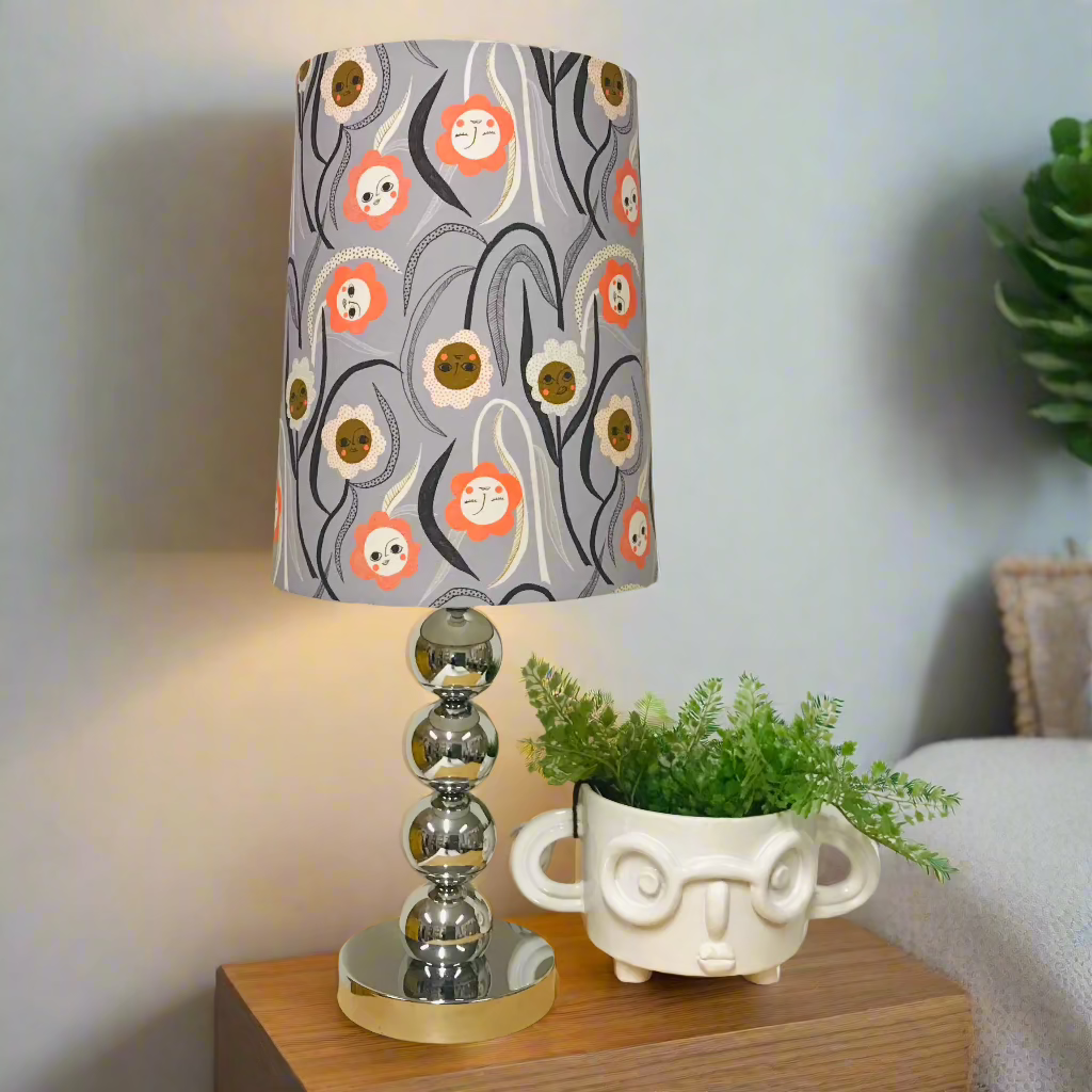 Sunbeam Faces Table Lamp